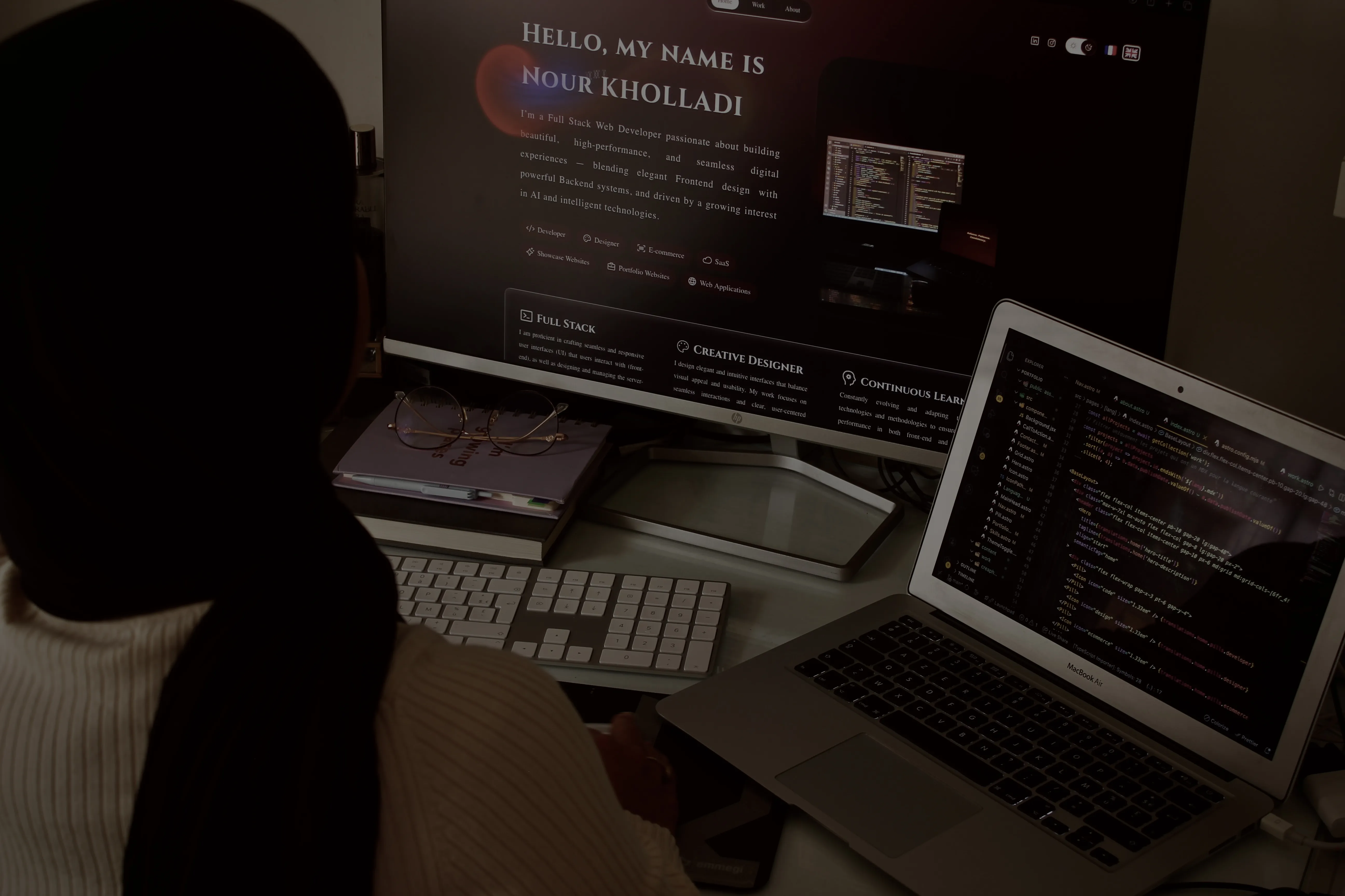 Nour Kholladi working on web development projects